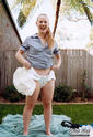 'Schoolgirl' Kylie Changes into Cloth & Plastic
