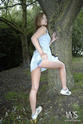 Sadie Sneaks Behind a Tree